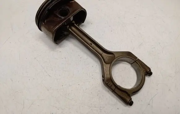 Piston with connecting rod