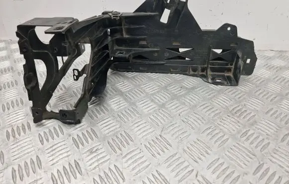 Headlight/headlamp mounting bracket