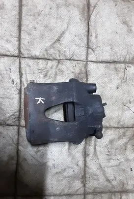 Volkswagen Golf VI Front brake caliper