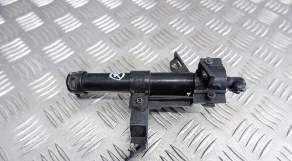 Headlight washer spray nozzle