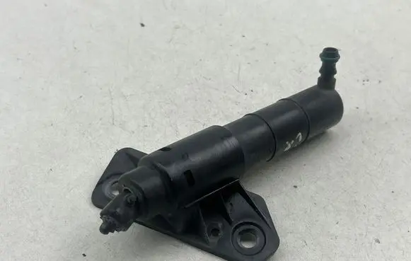 Headlight washer spray nozzle