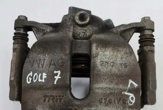 Volkswagen Golf VII Front brake caliper