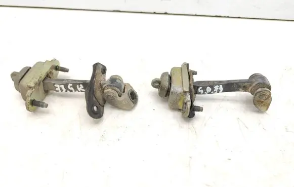 Ford Focus Rear door check strap stopper