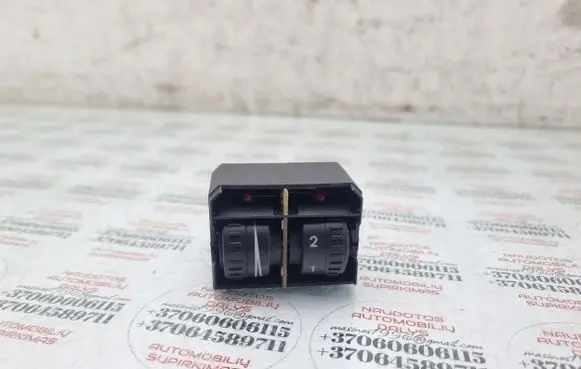 Headlight level height control switch