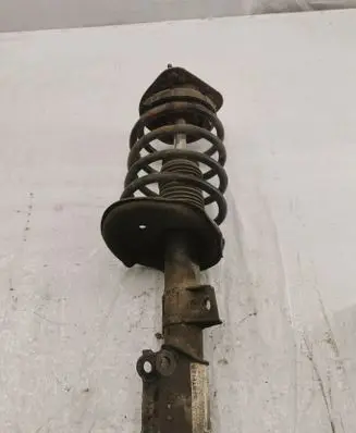 Front shock absorber with coil spring