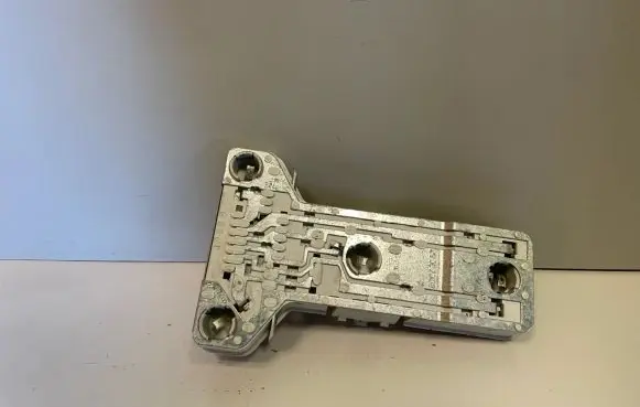 Tail light bulb cover holder