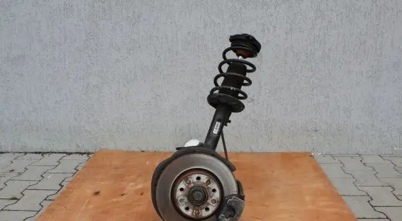 Volkswagen Golf VI Front wheel hub spindle knuckle 1K0407256T 1K0407272GM