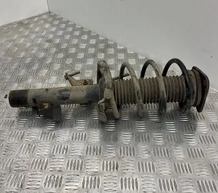 Volvo V50 Front shock absorber with coil spring 31277589