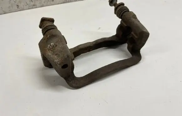 Subaru Forester SG Brake caliper pad carrier rear 