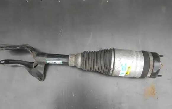 Jeep Grand Cherokee Front shock absorber with coil spring