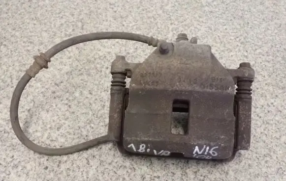 Nissan Almera N16 Front brake caliper