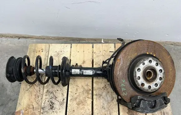 Volkswagen Caddy Front shock absorber with coil spring 5R3413031J