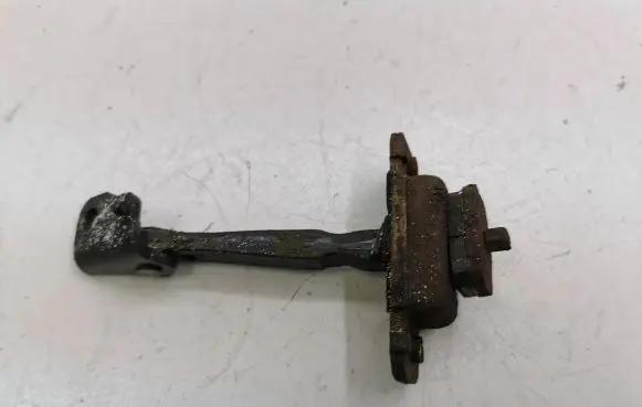 KIA Carens I Rear door check strap stopper