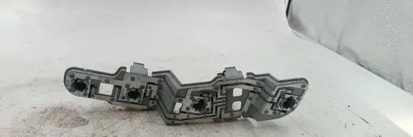 Tail light bulb cover holder