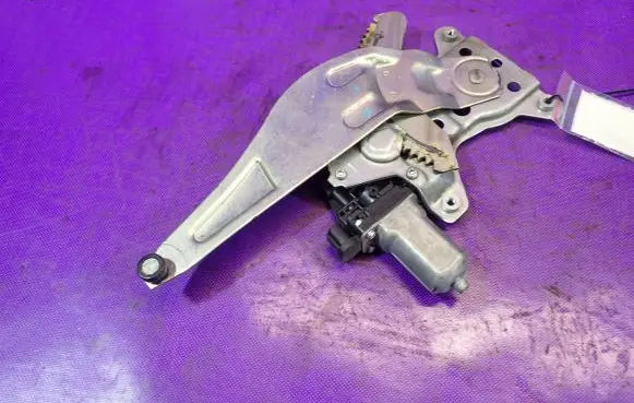 Suzuki Swift I Rear door window regulator with motor 83560-63J00