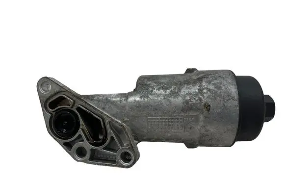 Opel Corsa E Oil filter mounting bracket 55560748 1101049