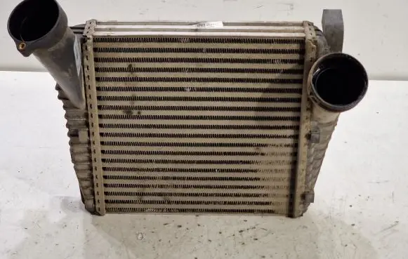 Volkswagen Touareg I Intercooler radiator 7L6145803F