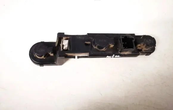 Tail light bulb cover holder
