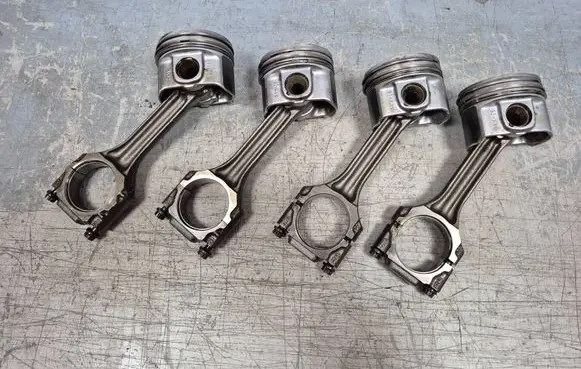 Piston with connecting rod