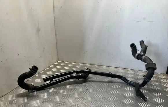 Volkswagen Golf VII Engine coolant pipe/hose 5Q0121064AD
