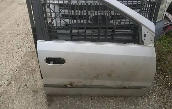 Nissan Almera Tino Front door PILKOS