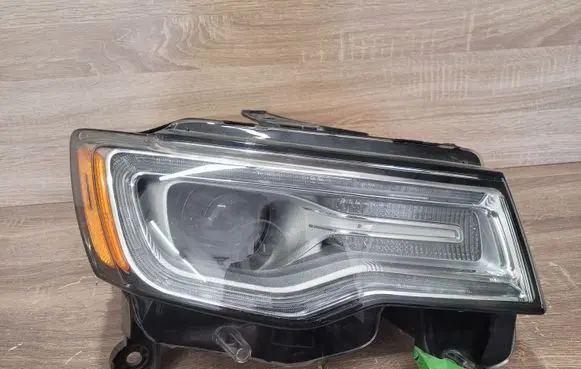 Jeep Grand Cherokee Headlight/headlamp 68289236AD T77625B 337122
