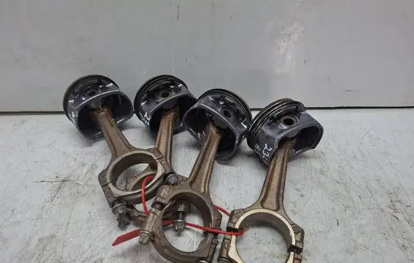 Opel Astra J Piston with connecting rod S27612069 B14XER A14XER