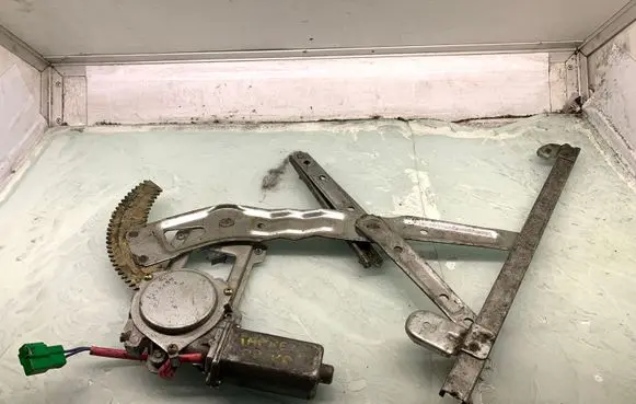 Subaru Impreza I Front door window regulator with motor 12V8X09
