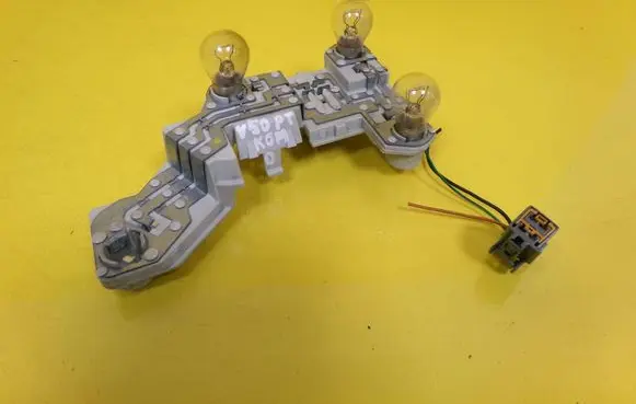 Volvo V50 Tail light bulb cover holder 28128007