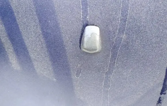 Windshield washer spray nozzle