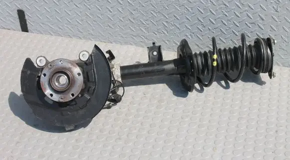 Nissan Qashqai J12 Front shock absorber with coil spring QASHQAI543036UA1B 543036UA1B