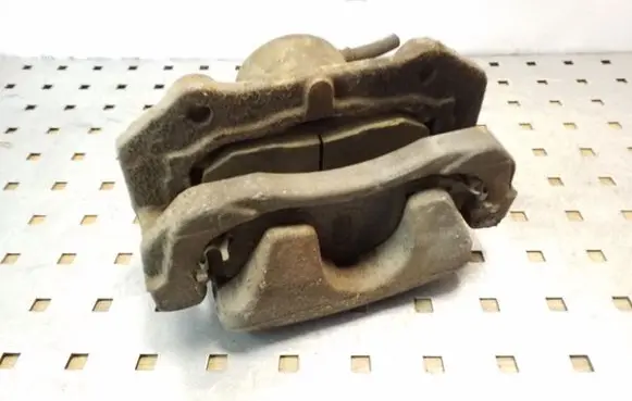 Suzuki Grand Vitara II Front brake caliper