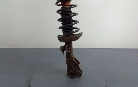 Front shock absorber with coil spring
