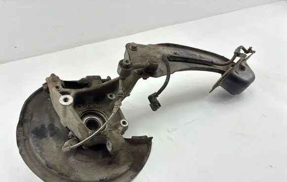 Volkswagen PASSAT B7 Rear wheel hub spindle/knuckle 3C0501476A 5N0615612D