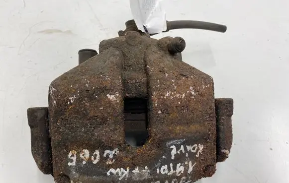 Volkswagen Touran I Front brake caliper 1K0615123E 1K0615123