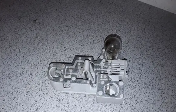 BMW 3 E46 Tail light bulb cover holder 6900472