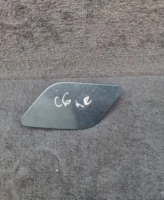 Headlight washer spray nozzle cap/cover