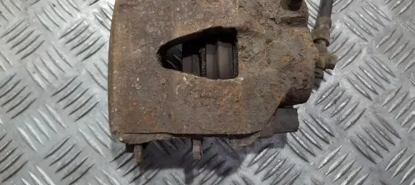 Volkswagen Golf V Front brake caliper