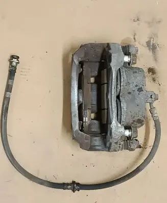 Nissan Leaf II (ZE1) Front brake caliper