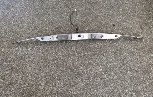 Jaguar S-Type Trunk door license plate light bar 4R8313550AE 4R8313550BE