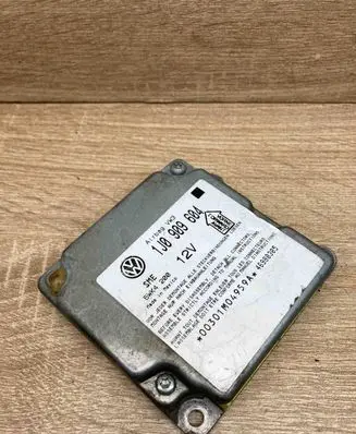 Volkswagen PASSAT B5 Airbag control unit/module 1J0909604 5WK4200
