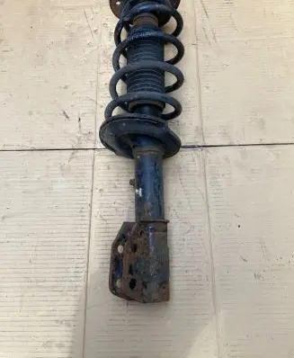 Front shock absorber with coil spring