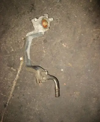 Thermostat/thermostat housing