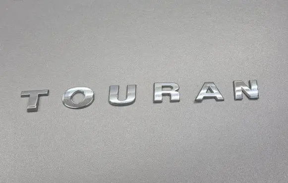 Volkswagen Touran II Manufacturers badge/model letters 