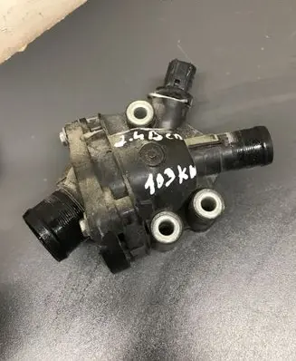 Thermostat/thermostat housing