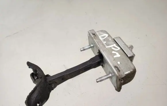 Front door check strap stopper
