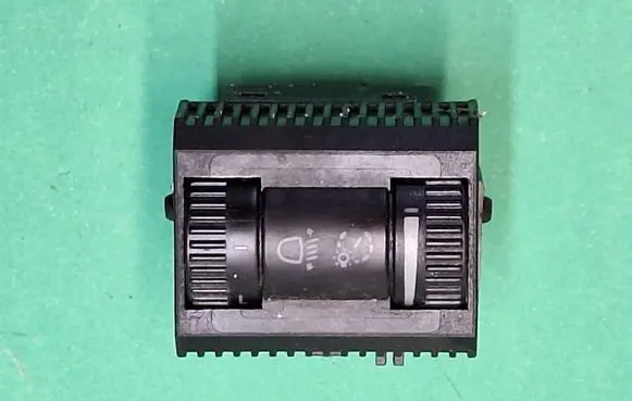 Headlight level height control switch