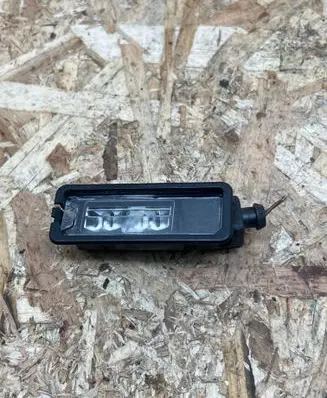 Volkswagen Golf VII Number plate light 1K8943021D 125015 02S4602