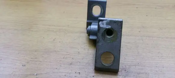 Front door lower hinge