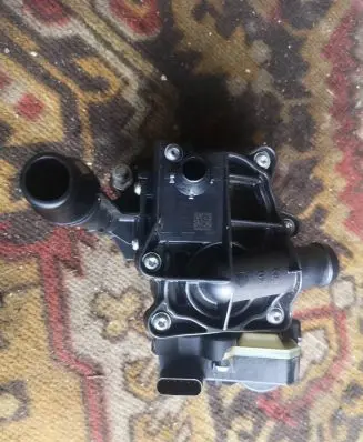 Thermostat/thermostat housing